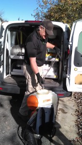 Mosquito Joe owner getting equipment out of the van